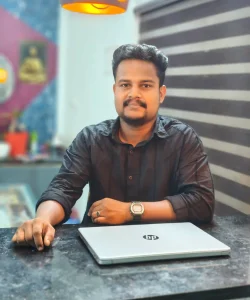 best freelance digital marketer in alappuzha sitting infront of a laptop